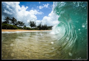 In the waves at Moloa'a Bay, Kauai.