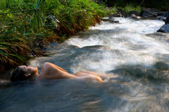 fine art landscape nude in the river in Kilauea, Kauai, Hawaii 