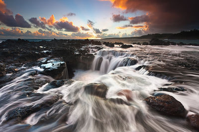 Kilauea, Kaua'i, Hawai'i rushing water seascape at sunrise