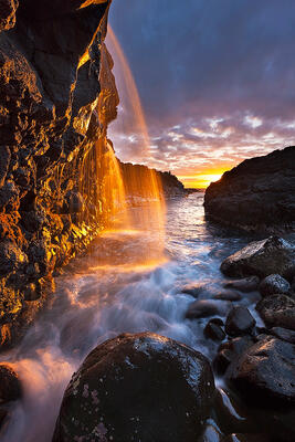 Princeville, Kaua'i, Hawai'i North Shore sunset waterfall