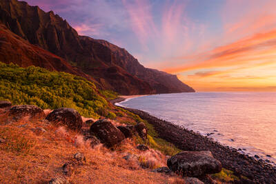 Sunset illuminates the landscape at Kalalau, Kauai, Hawaii.
