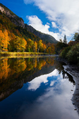 Sunset reflections along The Ausable river at Lake Placid, New York