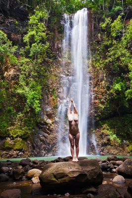 Artistic figure study poses at Secret Falls in Wailua, Kauai, Hawaii.