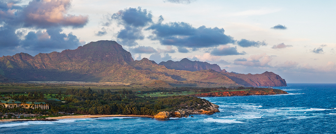 Good Eve Haupu I This aerial panoramic view capturing Shipwreck's Beach and the Mahaulepu coastline at sunset from Poipu, Kauai, Hawaii.